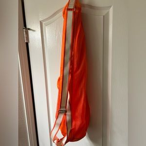 Orange Lululemon yoga mat bag